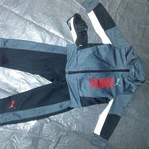 Boy's athletic suit and shoes